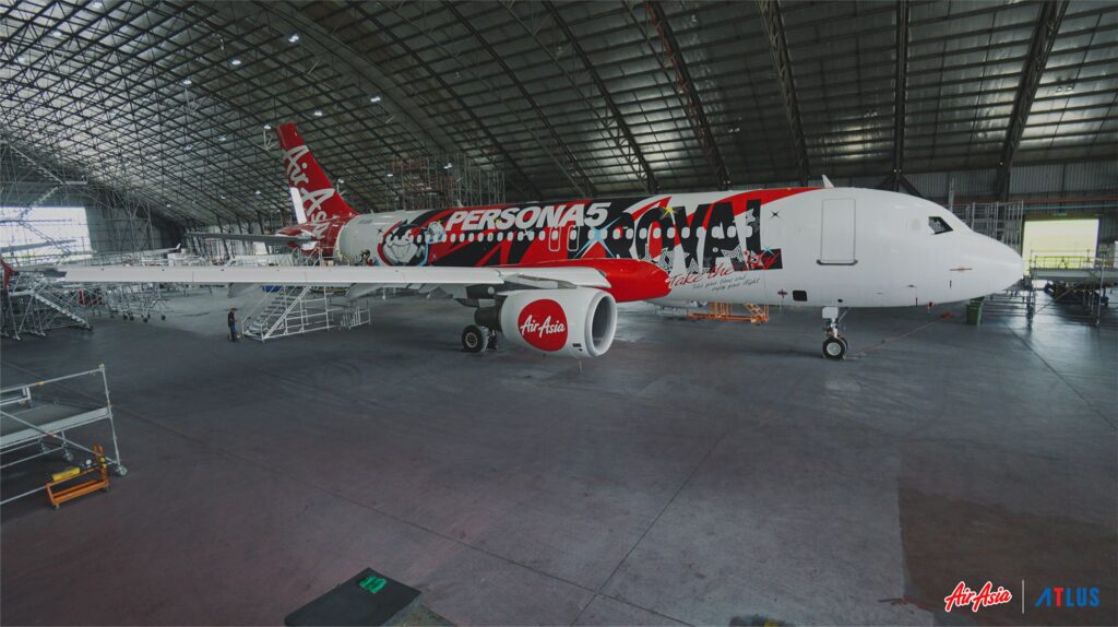 An Air Asia aircraft decorated with Persona 5 game imagery as part of a collaboration between AirAsia and SEGA