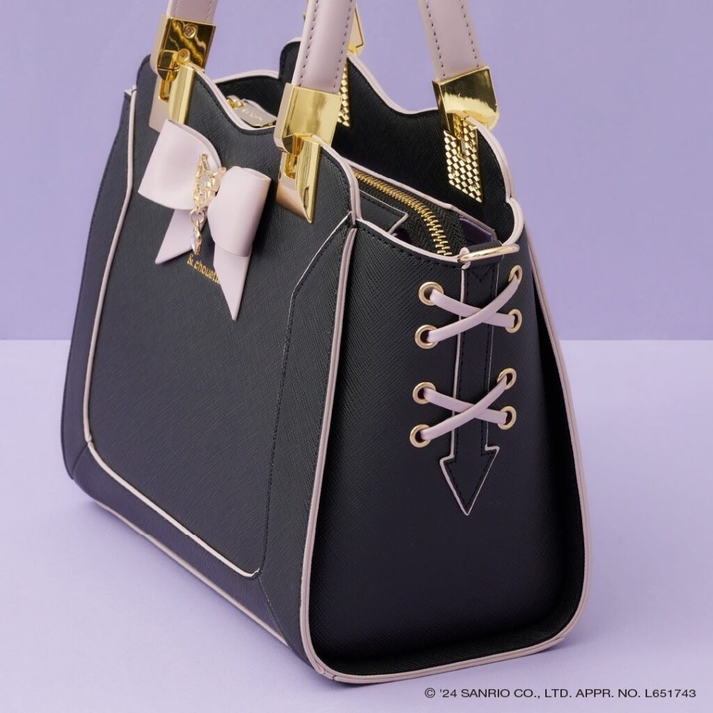 A side view of a handbag that is part of the & choutte x kuromi collection.