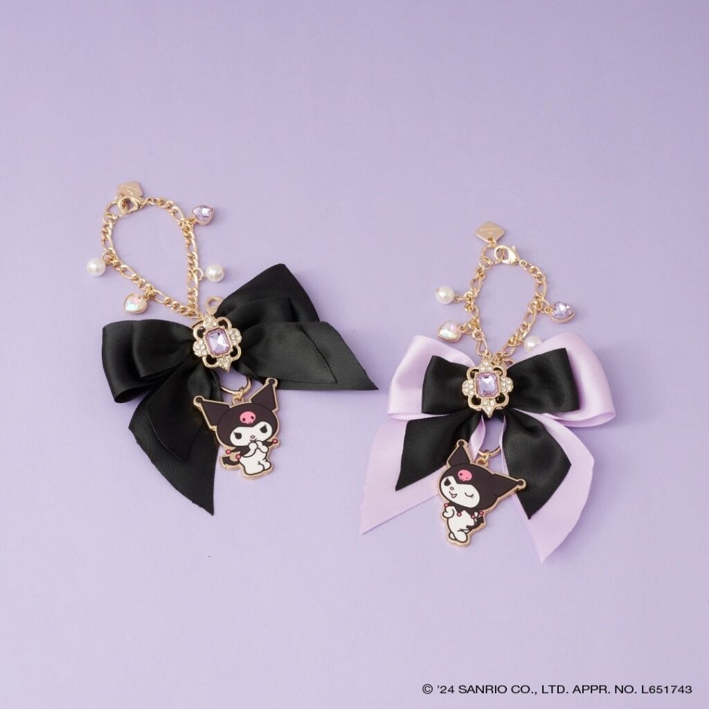 Two bag charms that are part of the & choutte x kuromi collection.