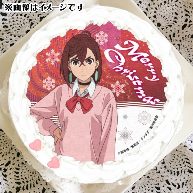 A Dandadan themed Christmas cake featuring Momo Ayase