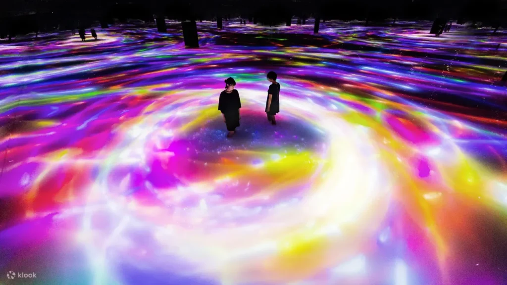 Watch as fish and seasonal flowers of light surround you as you walk in water