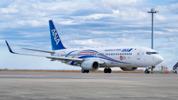 The EXPO2025 ANA JET plane parked up on an airfield