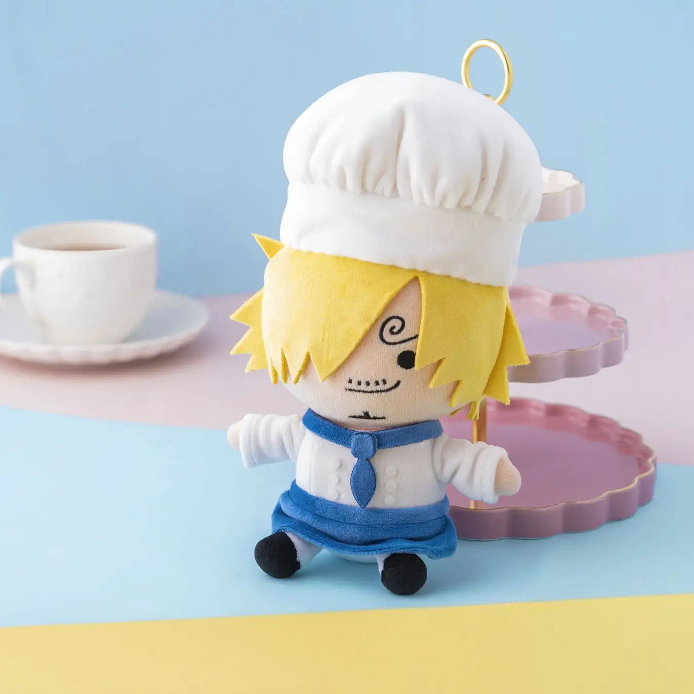 A plush of Sanji from One Piece in a chefs costume A plush of Sanji from One Piece in a chefs costume