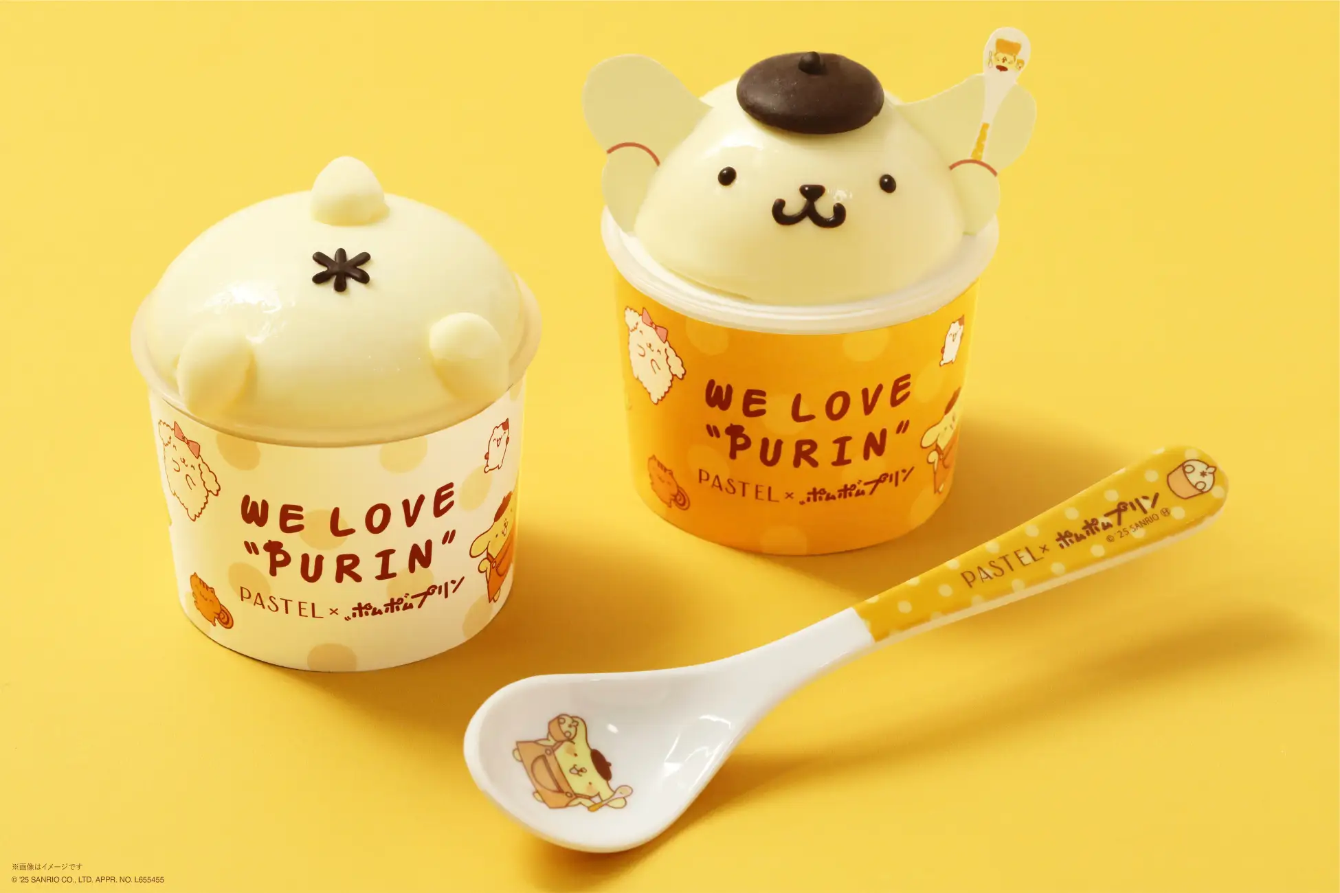 Two pudding desserts and a spoon Two pudding desserts and a spoon