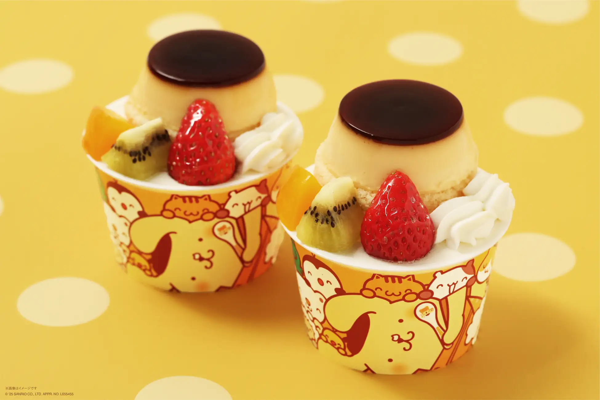 Two desserts topped with cream, pudding, strawberry, kiwi and peach Two desserts topped with cream, pudding, strawberry, kiwi and peach