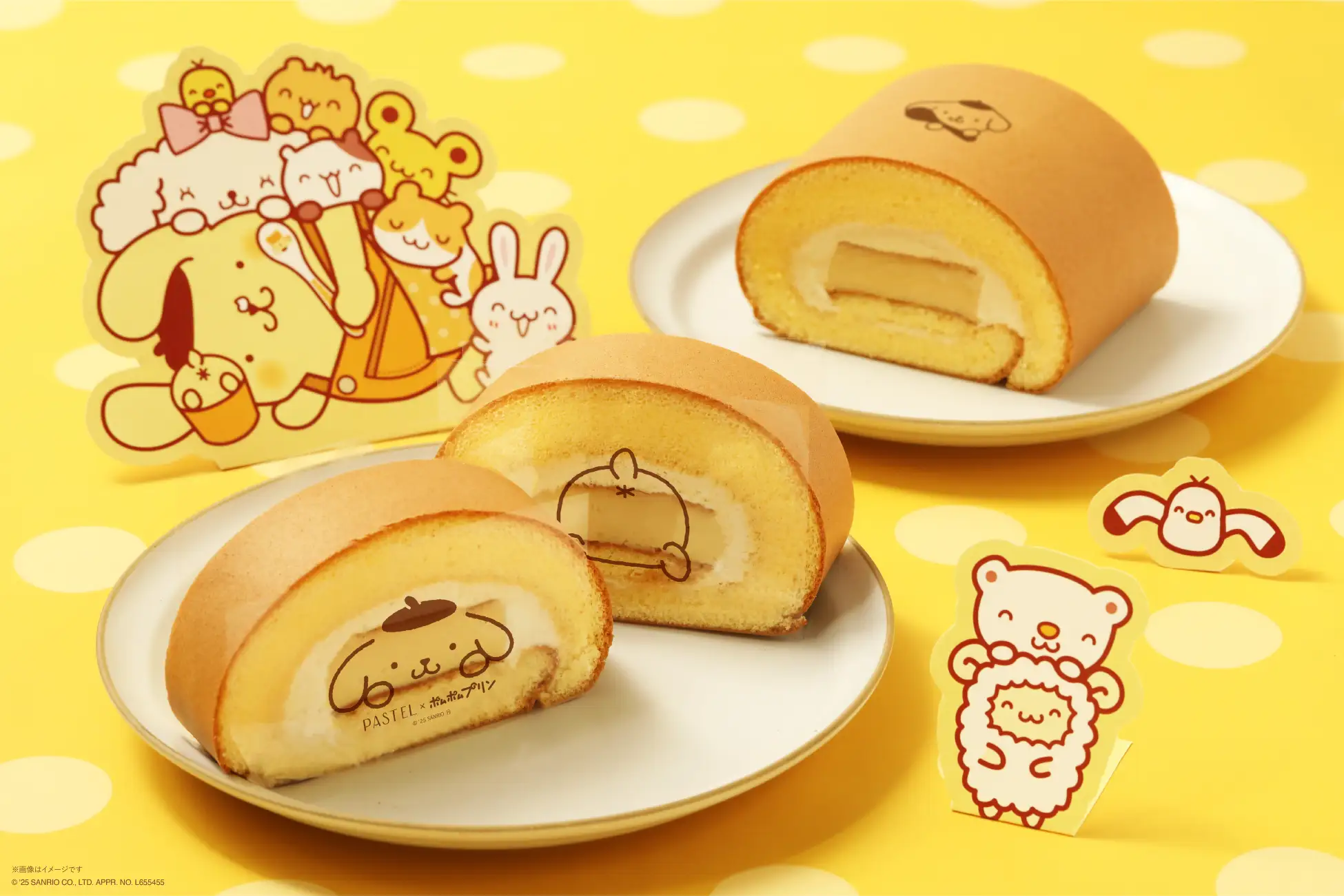 Two plate with a roll cake on each one Two plate with a roll cake on each one