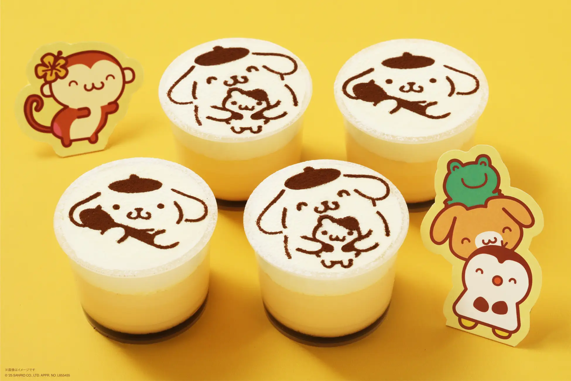 Four puddings with different designs on their tops made using cocoa powder Four puddings with different designs on their tops made using cocoa powder