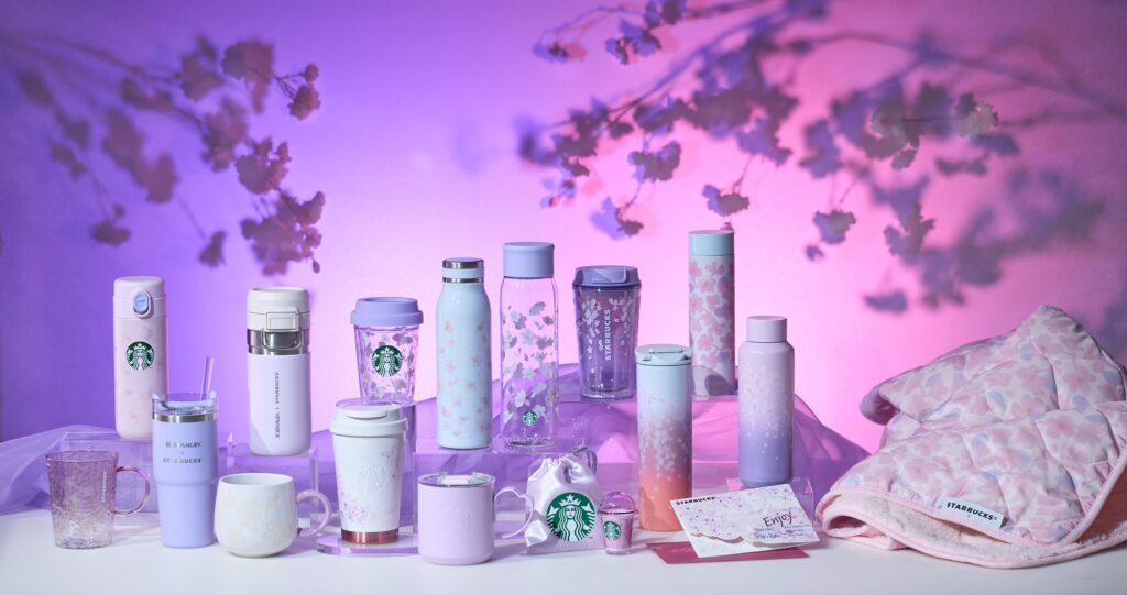 A collection of purple and blue drinkware from Starbucks