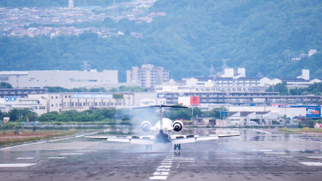 A plane landing at Osaka International Airport