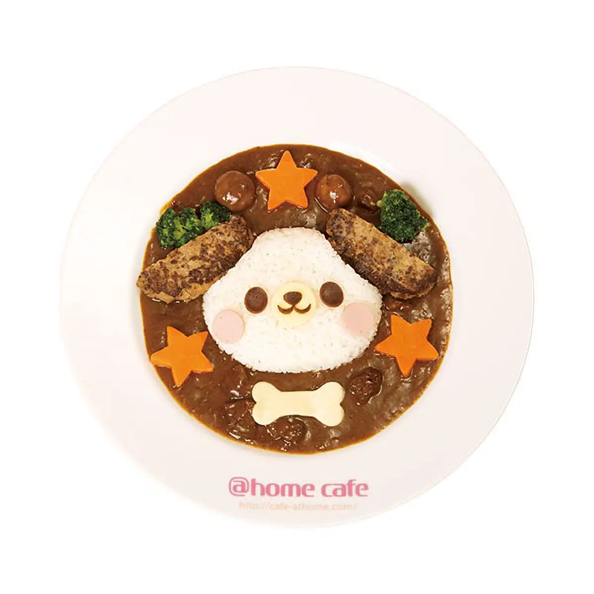 A plate of curry which has been arranged to look like a puppy's face A plate of curry which has been arranged to look like a puppy's face