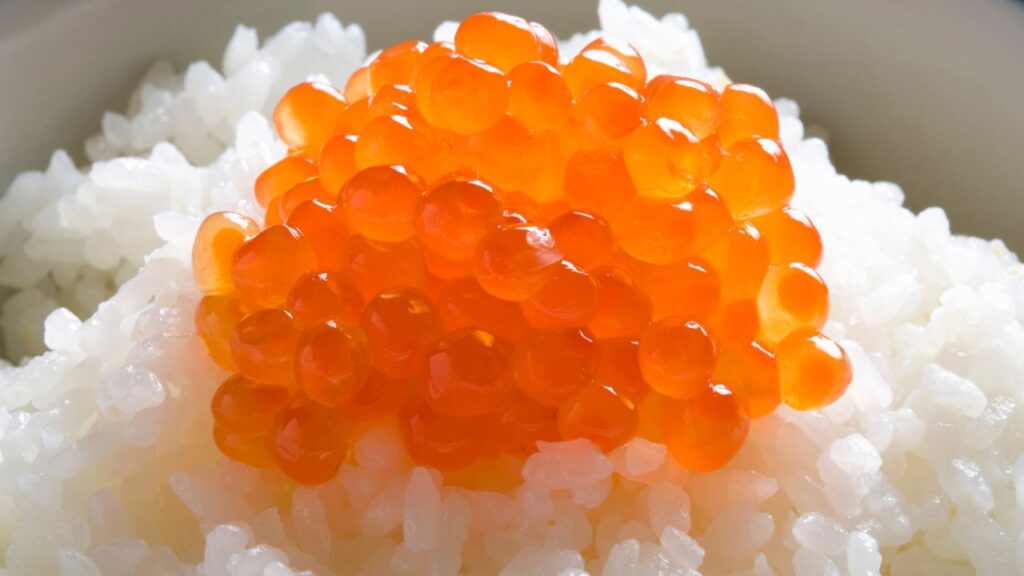 Salmon roe on top of white rice