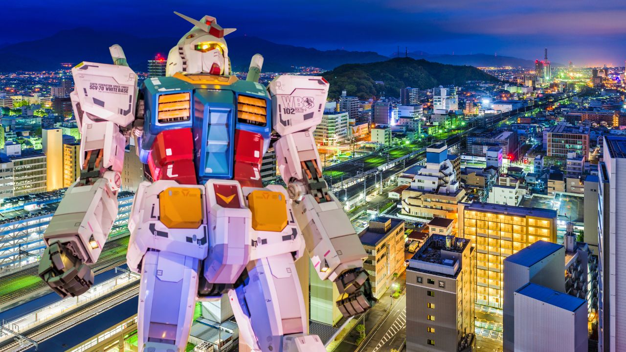 An image of a Gundam statue superimposed on the skyline of Shizuoka City