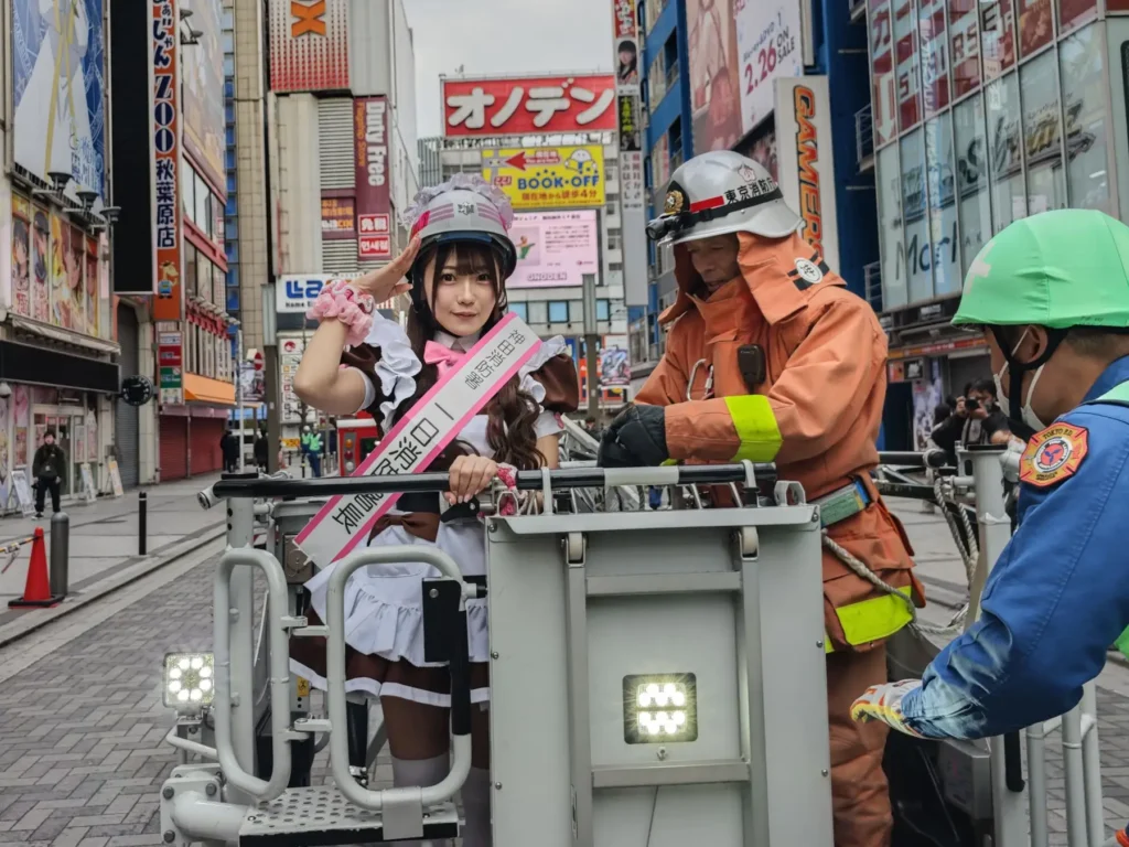 A maid standing in a ladder truck