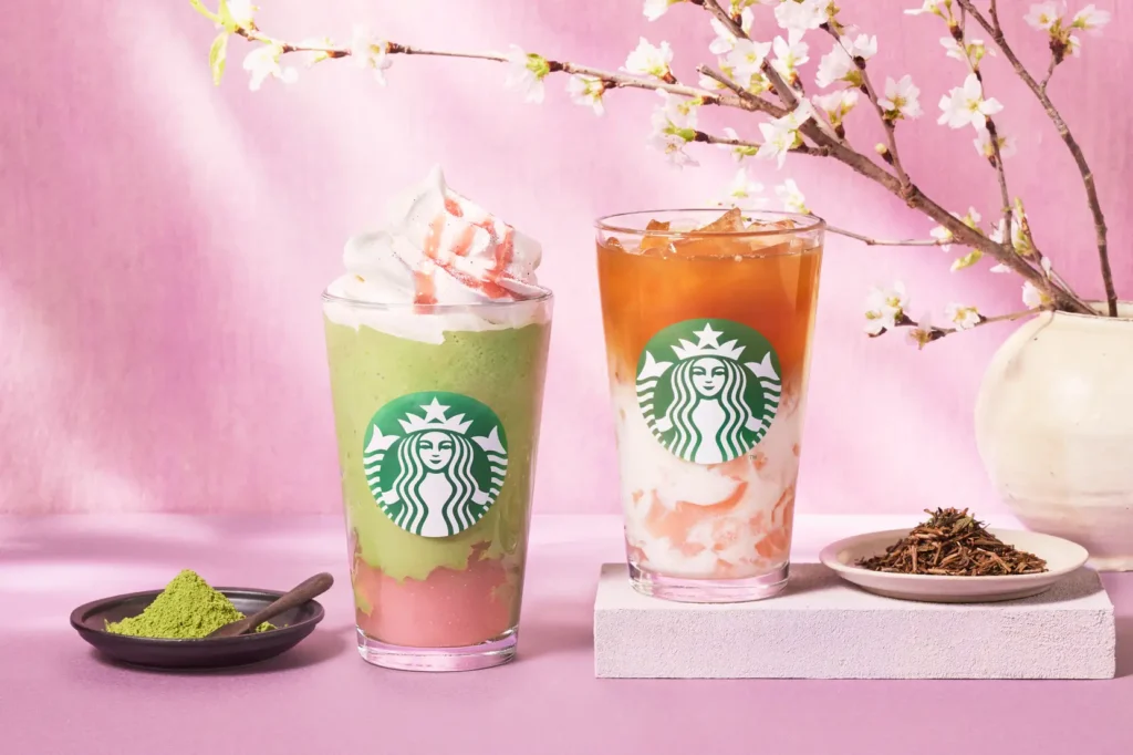 Two drinks from Starbucks - the Matcha and Sakura Warabimochi Frappuccino® and the Hojicha and Classic Tea Latte with Sakura Warabimochi