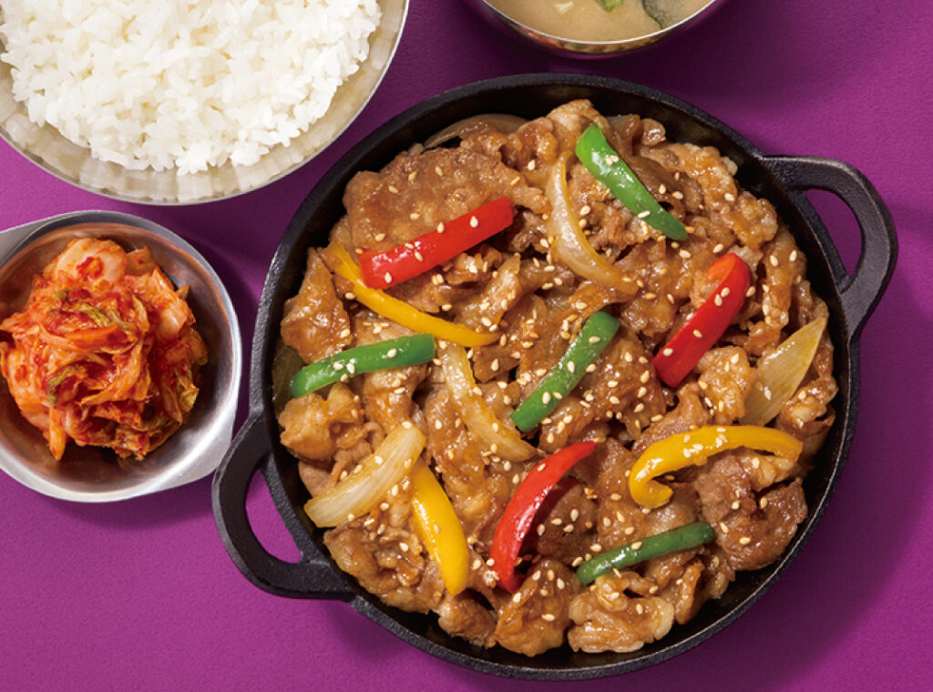 Bulgogi beef, rice and kimchi on a purple background