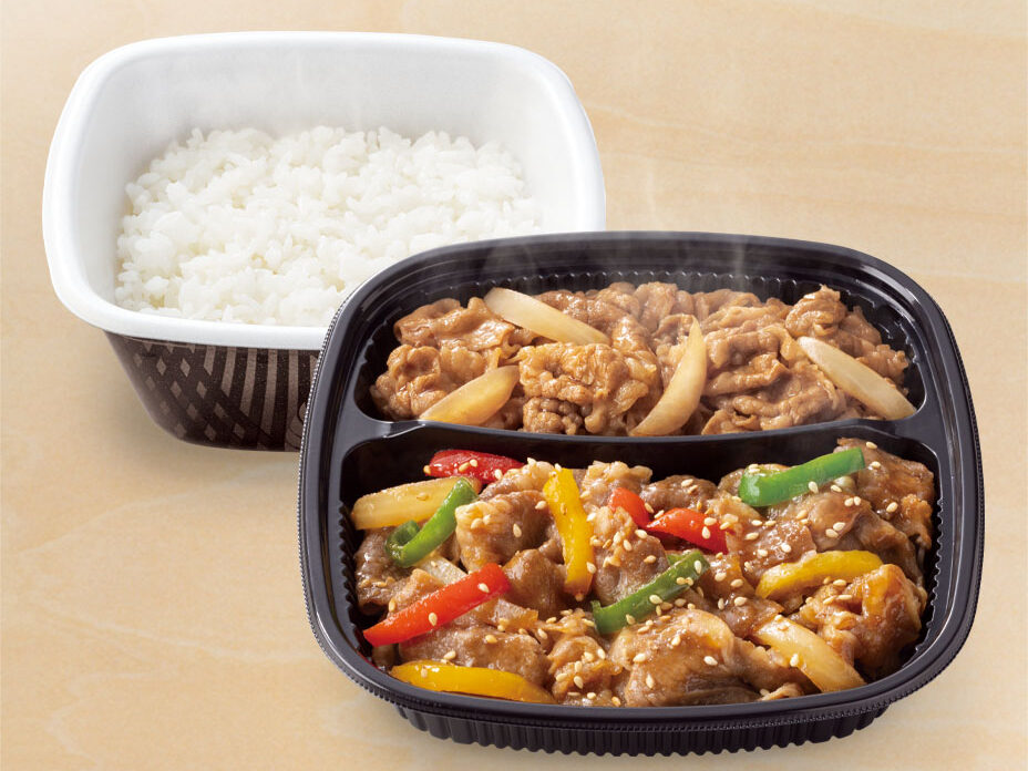 A plastic container holding rice alongside another container holding Bulgogi beef and gyudon beef